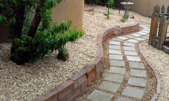 Curving  stone pathway with rock walls